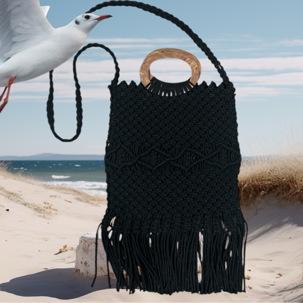 Gently used Danielle Nicole Black Crossbody Bag with Fringe and Wooden Handle